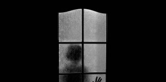 Estupro e aborto: precisamos falar sobre isso; na imagem se vê silhueta de criança olhando através de janela de vidro