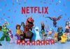 Personagens infantis com uma faixa de parabéns, ilustrando matéria sobre vídeos de feliz aniversário da Netflix.
