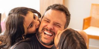 Fernando Dias e as filhas num momento de carinho